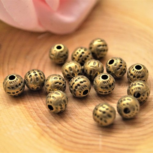 Perles rondes en métal bronze rayées 6 mm par 20