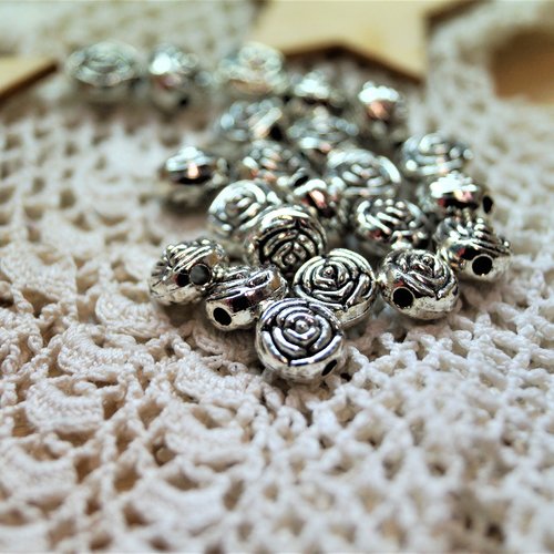 Perles fleurs en métal argent vieilli 7*7 mm par 10