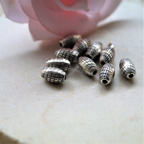 Perles ovales rayées en métal argent vieilli 9*6 mm