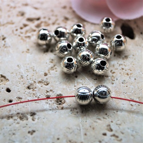 Perles rondes oeil en métal argent vieilli 6 mm