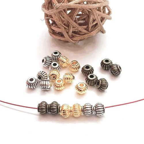 Perles métal lanternes rayées 5*4 mm par lot de 25