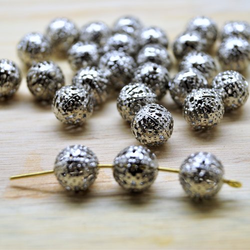 Perles 10 mm métal argenté mat en filigrane évidé