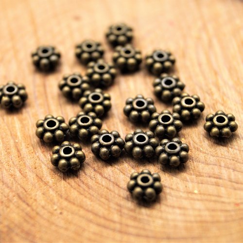Perles intercalaires fleurs bronze 5 mm