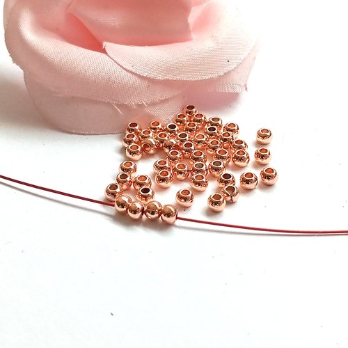 Micro perles rondes lisses en laiton or rose 3mm par lot de 50