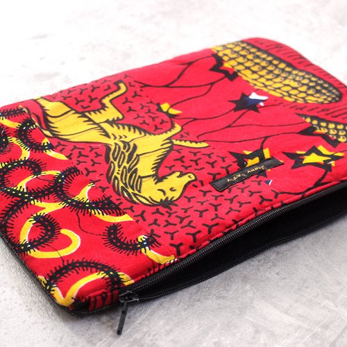 Pochette matelassée en patchwork wax, petits chevaux, étoiles, épis de maïs, orange, rouge, tissu africain, pagne, ankara