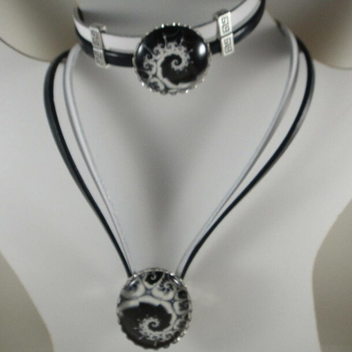 Jolie parure composée d'un collier et d'un bracelet en cuir véritable noir et blanc avec bouton pression ovale