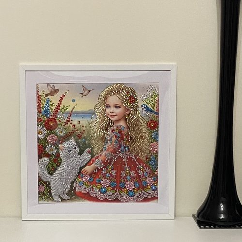 Tableau encadré diamond painting, petite fille et son chaton au jardin, 30x30 cm