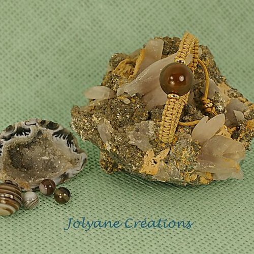 Bracelet shamballa tibétain une perle en agate œil de shiva macramé nylon tressé ambre