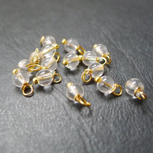 40 perles grelots ronds en verre transparent et doré 4x8mm breloques