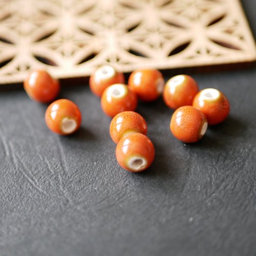 4 perles en céramique ronde orange 10mm
