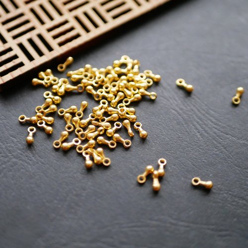 100 breloques gouttes doré 2x7mm