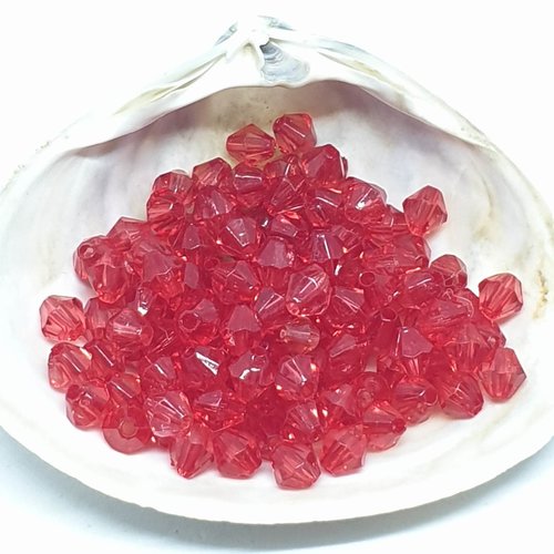 Lot de 10 perles en acryliques toupies rouges