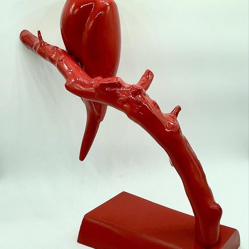 Sculpture perroquet rouge laqué