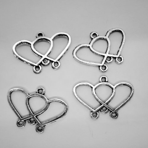 4 breloques pendentifs estampes "coeur" réversibles en métal argenté