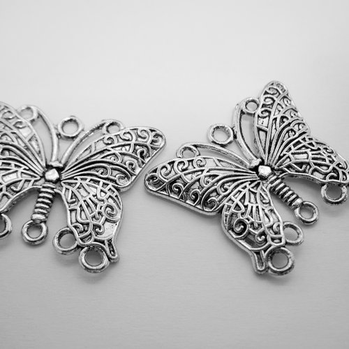2 grandes estampes papillon  à garnir en métal argenté