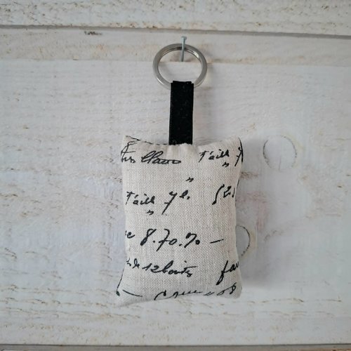 1 porte clés (n°203) écriture