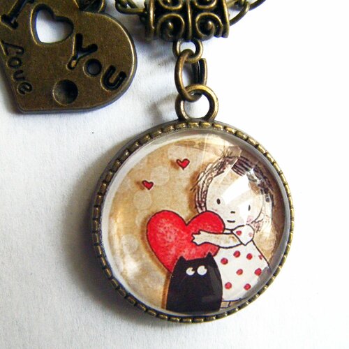 Pendentif cabochon petite fille et chat noir