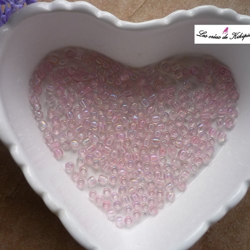 Perles de rocaille roses irisées 20 gr.