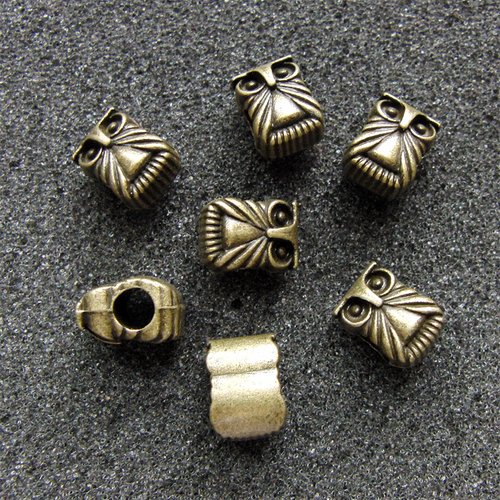 6 perles passantes hibou pour cuir rond - tube, couleur bronze