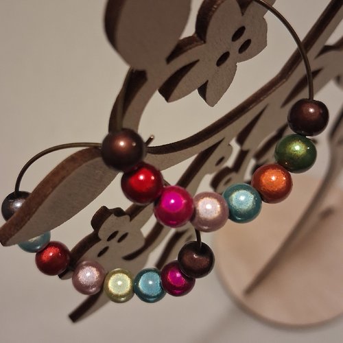 Créoles bronze  et perles magiques miracles  multicolores