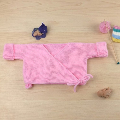 Brassière bébé naissance rose pelote de fil à tricoter