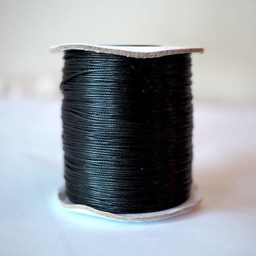 Cordon de polyester très fins 0.05 mm couleur noir vendu au mètre *pour bracelet* 