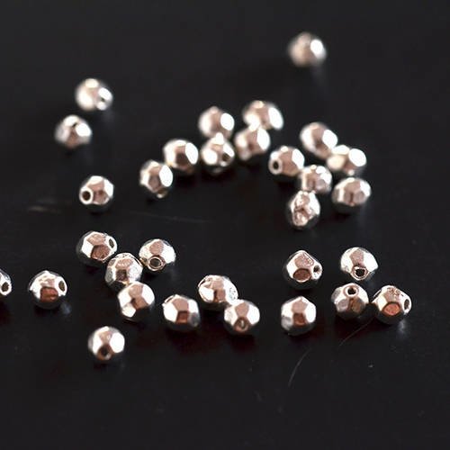 Lot de 10 perles intercalaires ovales à facette métal argenté 4 mm 