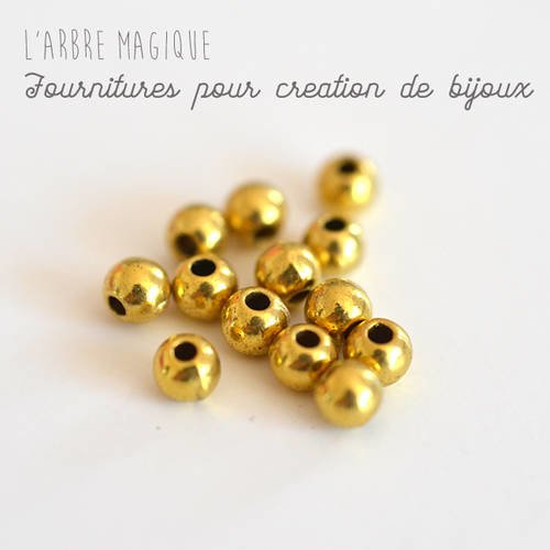 Perle métal doré ronde 5 mm dimension vendue à l'unité 