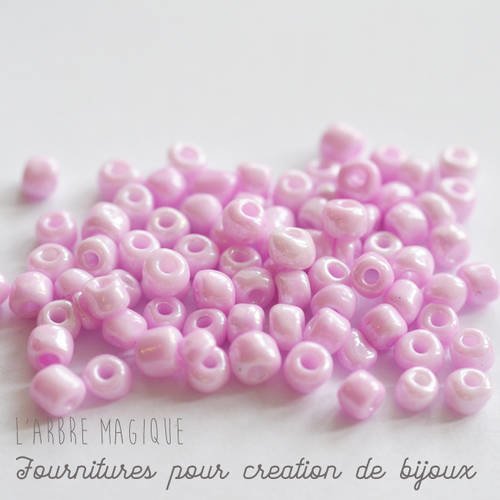 10g rocaille rose nacré opaque plus ou moins 100 perles 
