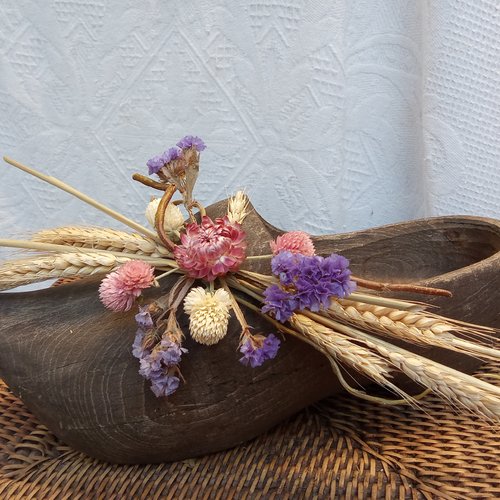 Sabot de bois fleuri de fleurs séchées