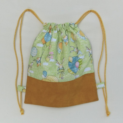 Sac à dos tissu bébé sale