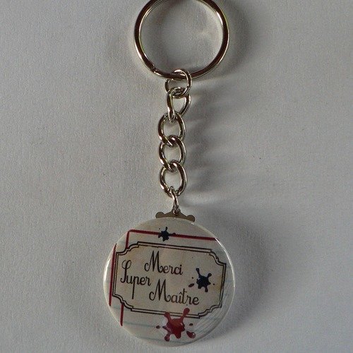 Badge porte clés 38mm  merci super maître  cadeau maître d'école. 