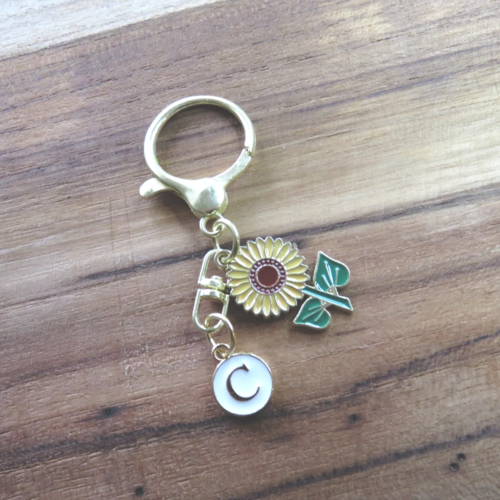 Bijou de sac porte clés fleur tournesol personnalisé initiale
