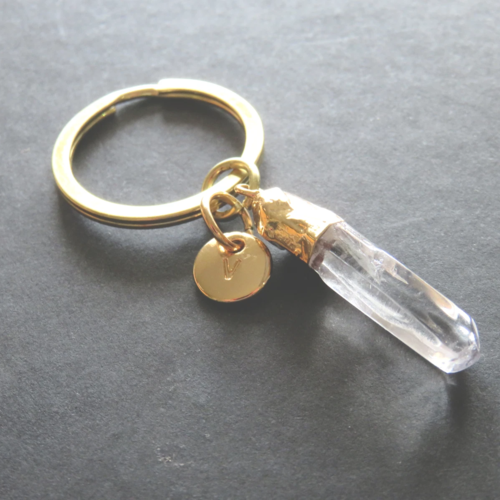 Porte clés pierre de roche naturelle initiale dorée