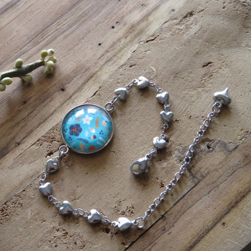 Bracelet cabochon fleurs fond turquoise réglable acier inoxydable