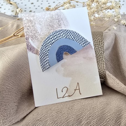 Broche arc-en-ciel bleu