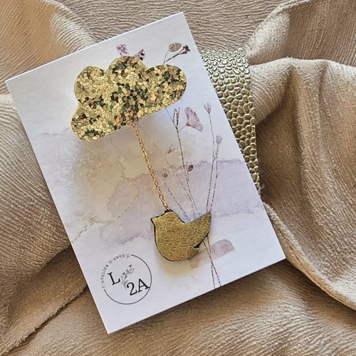 Broche de noël: nuage et oiseau or