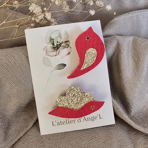 Duo de broches oiseau et lotus rouges