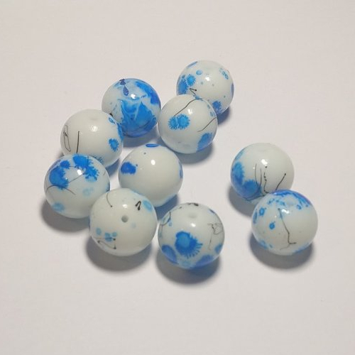 Perles céramiques blanches tachées bleu