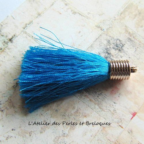 Gros pompon bleu embout argente (r503) 