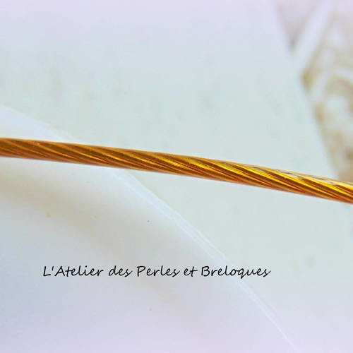 1 mètre de fil d'acier câblé doré (vieil or)  - diam. 1 mm  (r255) 
