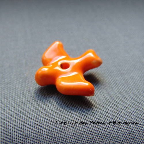 Perle en ceramique oiseau  orange 