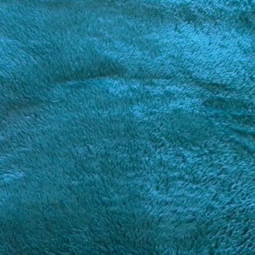 Fourrure synthétique poils mi - long turquoise