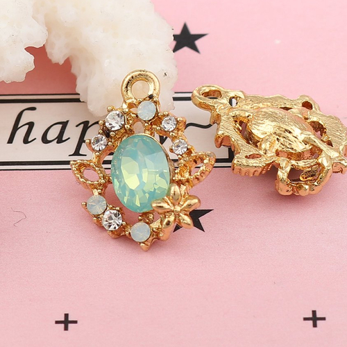 Breloque fleur doré à strass vert clair 18 x 14mm
