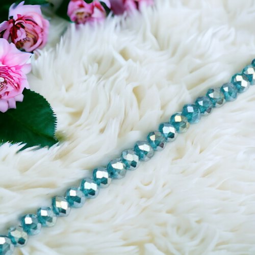 Perles en verre bleu paon facettes 4mm - x20