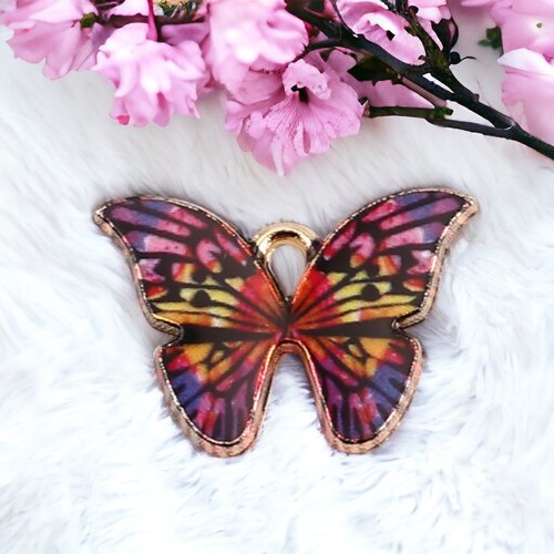 Breloque papillon doré multicolore 22mm