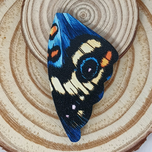 Pendentif papillon bleu 55 mm