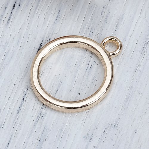 Breloque géométrique ronde creux doré 19 x 16mm