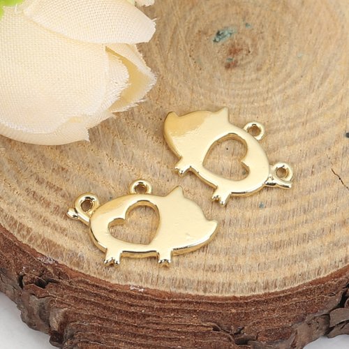 Breloque cochon coeur creux doré 17 x 11 mm