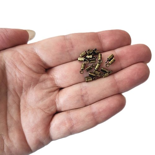 Lot de 20 pinces lacets 1,5 mm métal couleur bronze